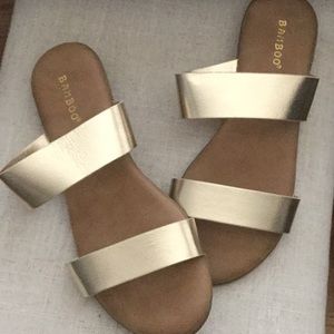 NWOT incredibly comfortable gold slides